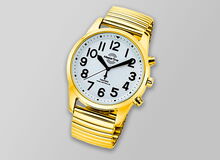 Ansicht auf die goldene Herrenuhr.