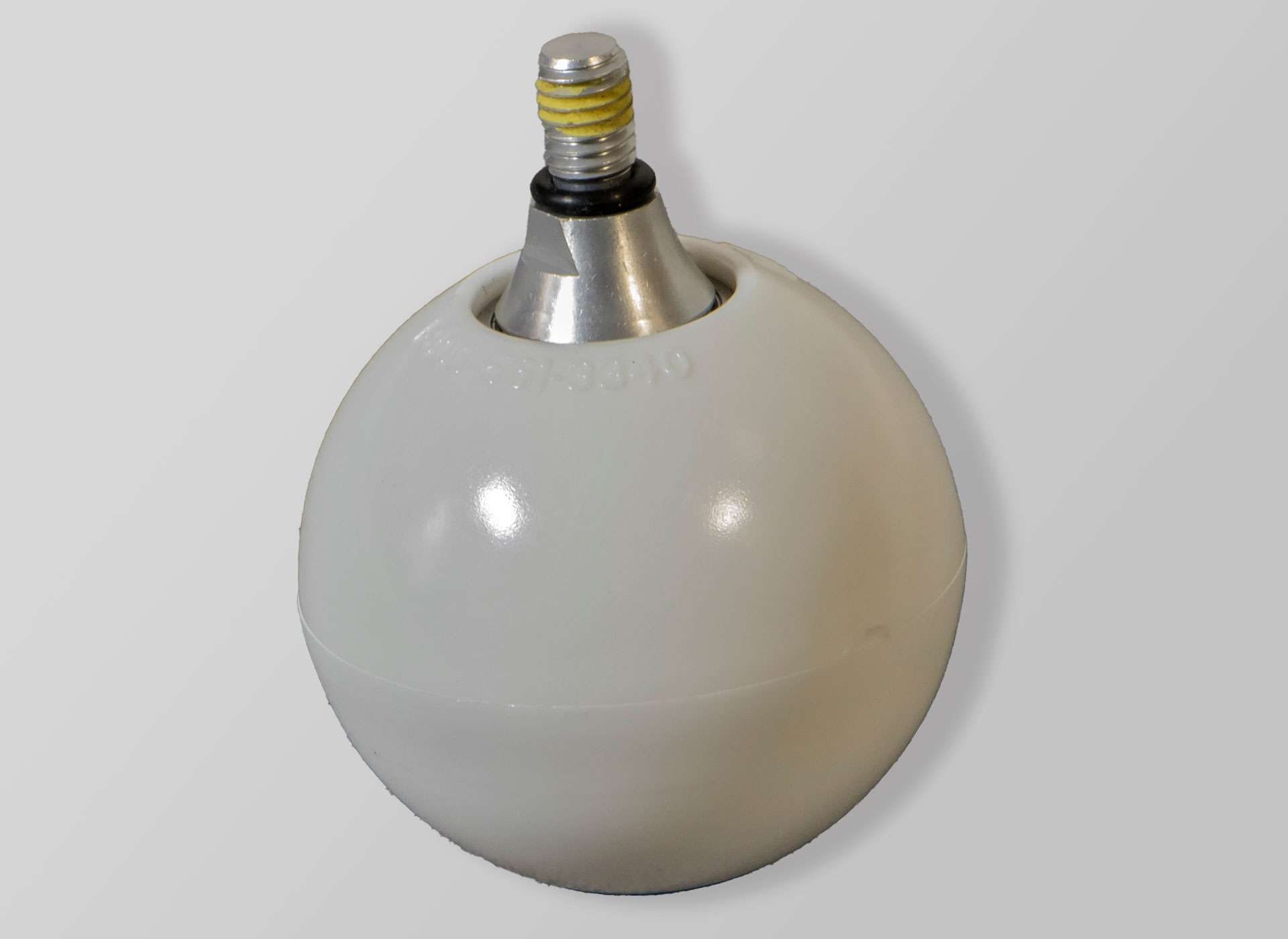 Ansicht auf eine weiße runde Rollspitze mit Metallgewinde für einen Blindenlangstock